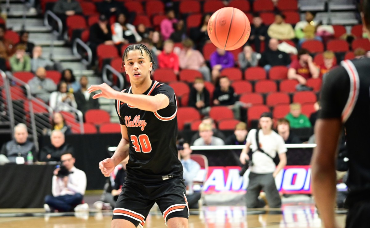 Valley's Curtis Stinson throws a pass to a teammate during the Class 4A state championship game against Cedar Rapids Kennedy at Wells Fargo Arena in Des Moines on Friday. (Photo by Ryan Timmerman)